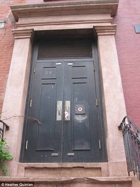 Through the keyhole: Behind the rustic red-brick facade of 58 Joralemon Street, in the heart of Brooklyn, lies a gaping void of nothing whatsoever